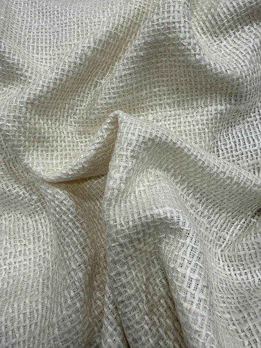 Primer plano de la textura del tweed saco blanco