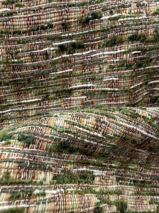 Detalle del efecto jaspeado de la tela verde
