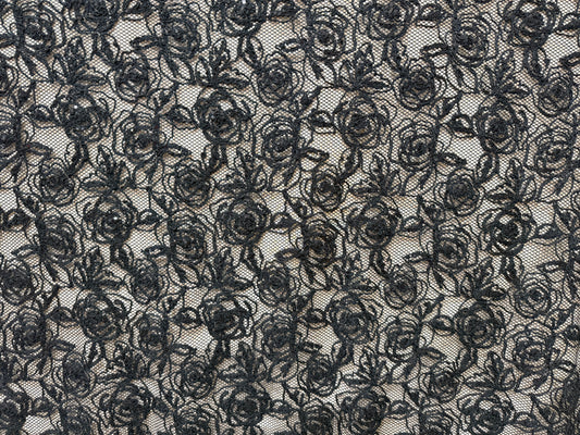 Tela tul floral negra transparente con bordado en relieve