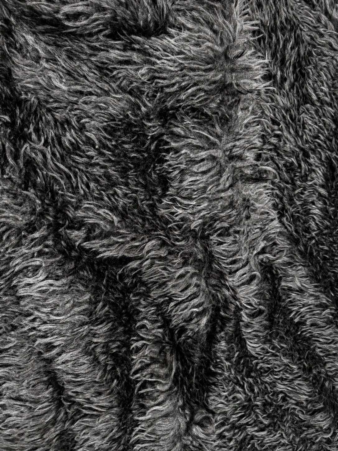 Detalle del pelo largo negro - Arte con Telas
