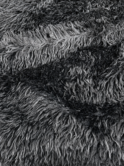 Primer plano de la textura del pelo largo negro - Arte con Telas