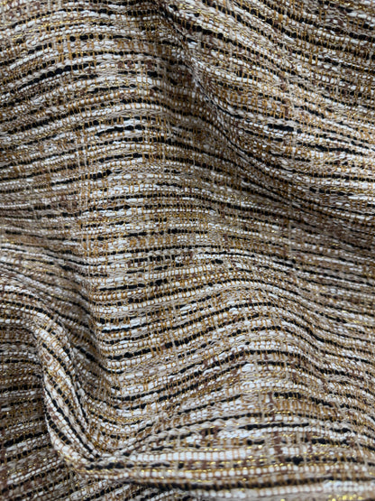 Primer plano del tejido de tweed doré