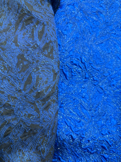 Primer plano de la textura del brocado azul Klein - Arte con Telas