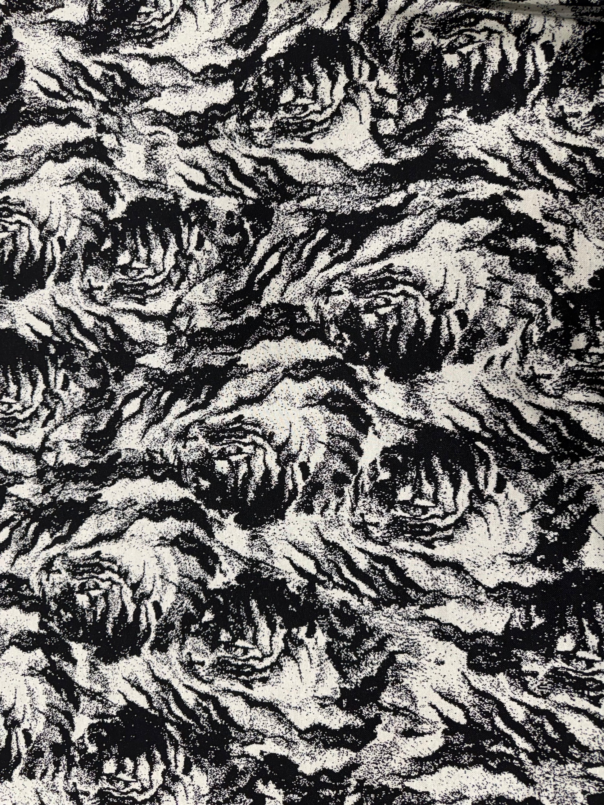 Detalle del tejido de punto blanco y negro - Arte con Telas