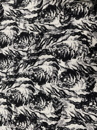 Detalle del tejido de punto blanco y negro - Arte con Telas