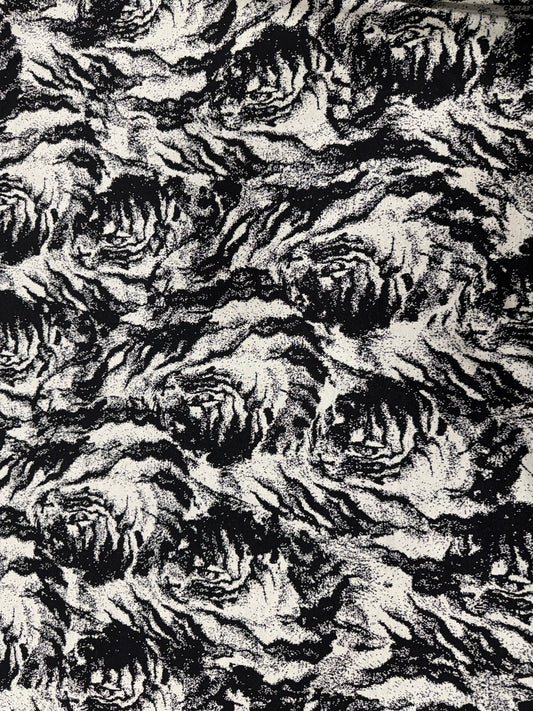 Detalle del tejido de punto blanco y negro - Arte con Telas