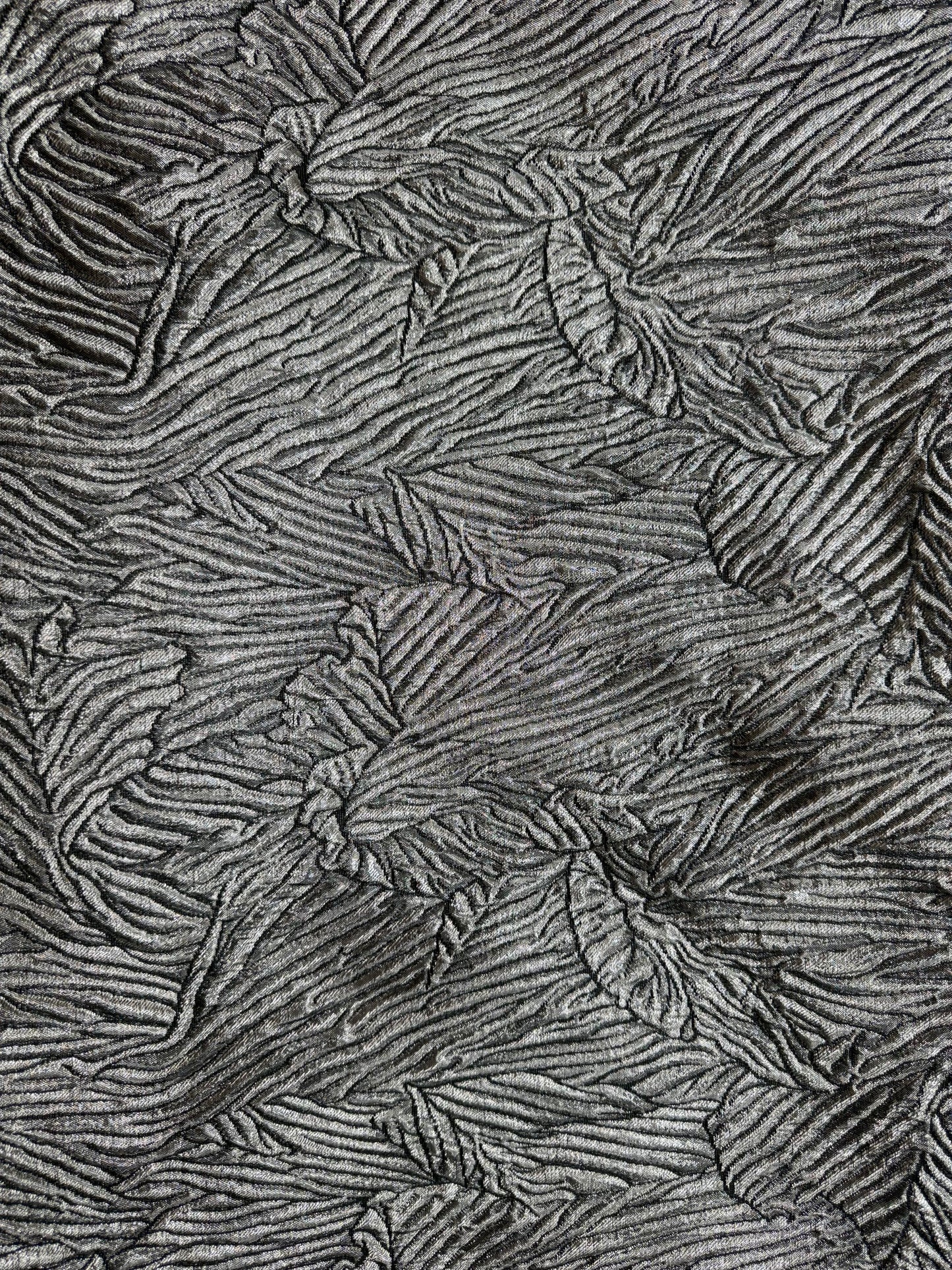 Primer plano de la textura del jacquard metalizado - Arte con Telas