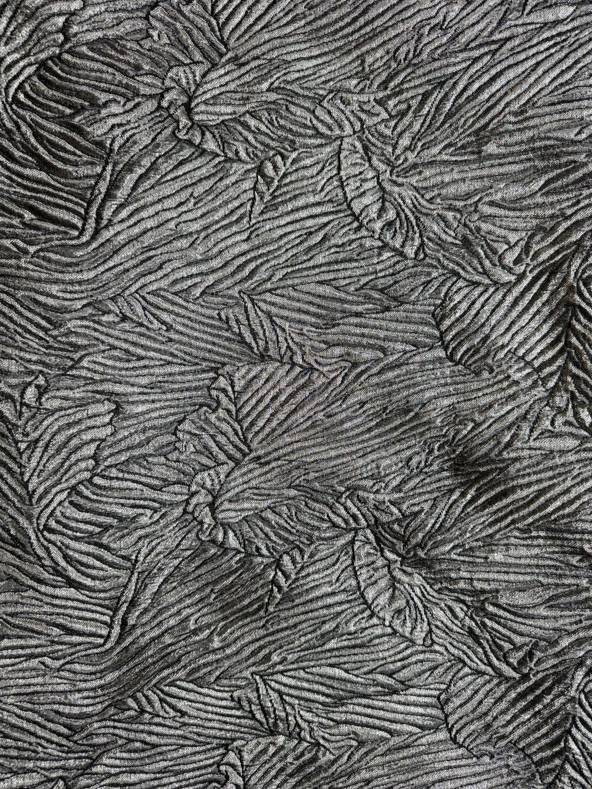 Primer plano de la textura del jacquard metalizado - Arte con Telas