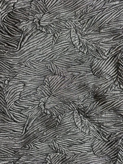 Primer plano de la textura del jacquard metalizado - Arte con Telas