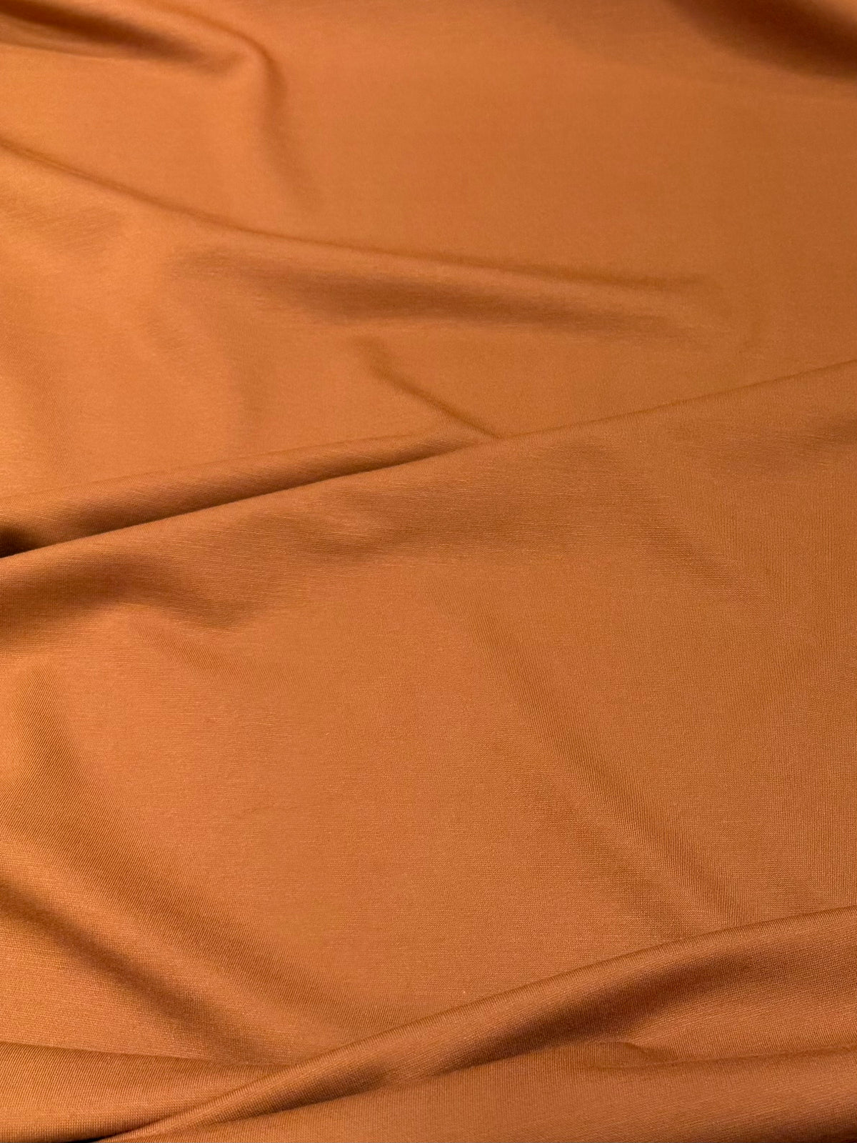 Tela de punto elástico color naranja quemado - Arte con Telas