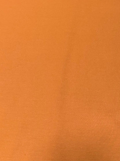 Caída y elasticidad de la tela de punto naranja quemado - Arte con Telas