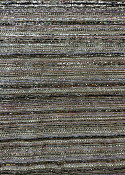 Caída de tela bordada brillante con rayas horizontales